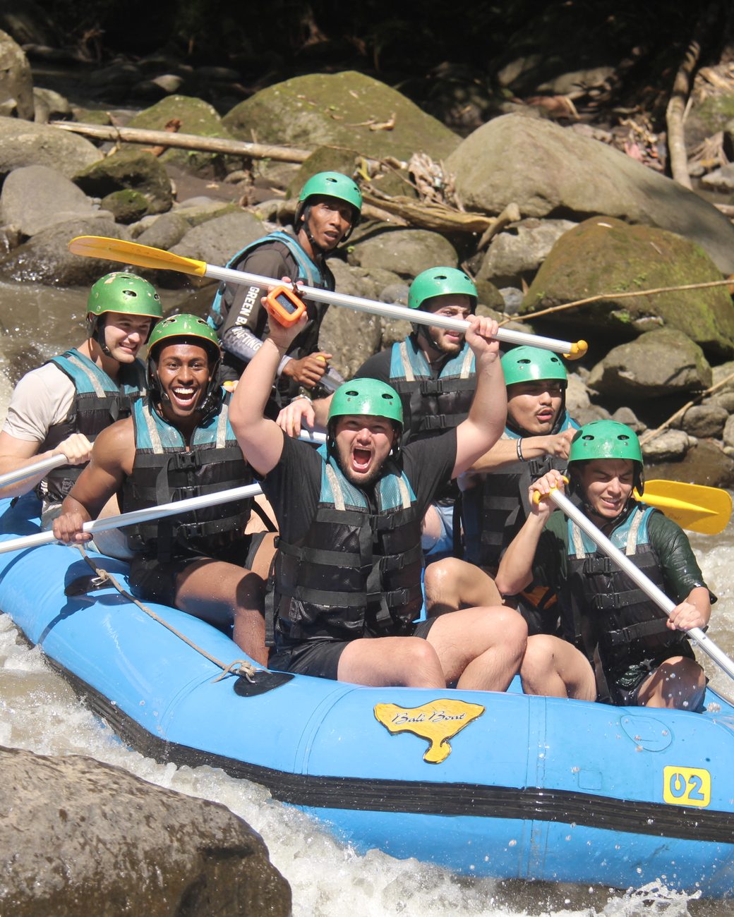 Evo team white-water rafting on a company trip